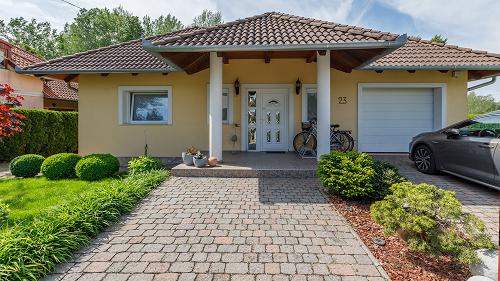 It is a beautiful and tasteful, discreet family house for sale a few minutes away from the shoreline of lake Balaton.