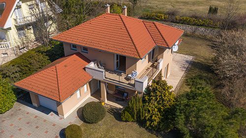 Panoramic view, Balaton property.  On the northern shoreline of Lake Balaton, in a quiet street, it is a high-quality family house on a spacious plot for sale. 