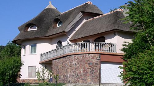 This exclusive thatched villa is one of the properties on the northern shoreline of lake Balaton. It has a unique, beautiful view to the lake Balaton.